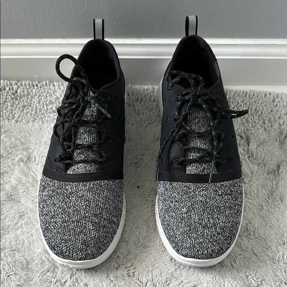 NWOT Black and Gray Men's Size 8/ women’s size 10 Under Armour sneakers.